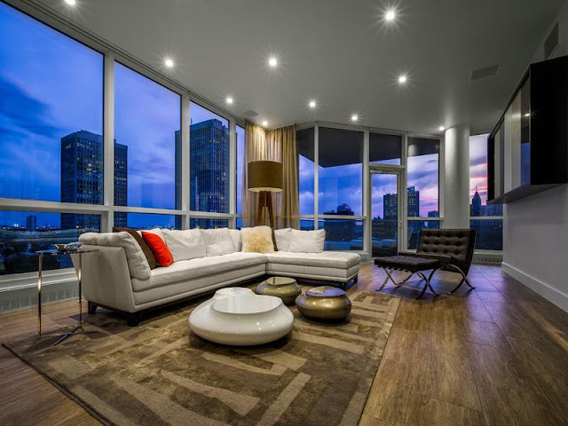 Photo of white furniture in the living room of Philadelphia penthouse
