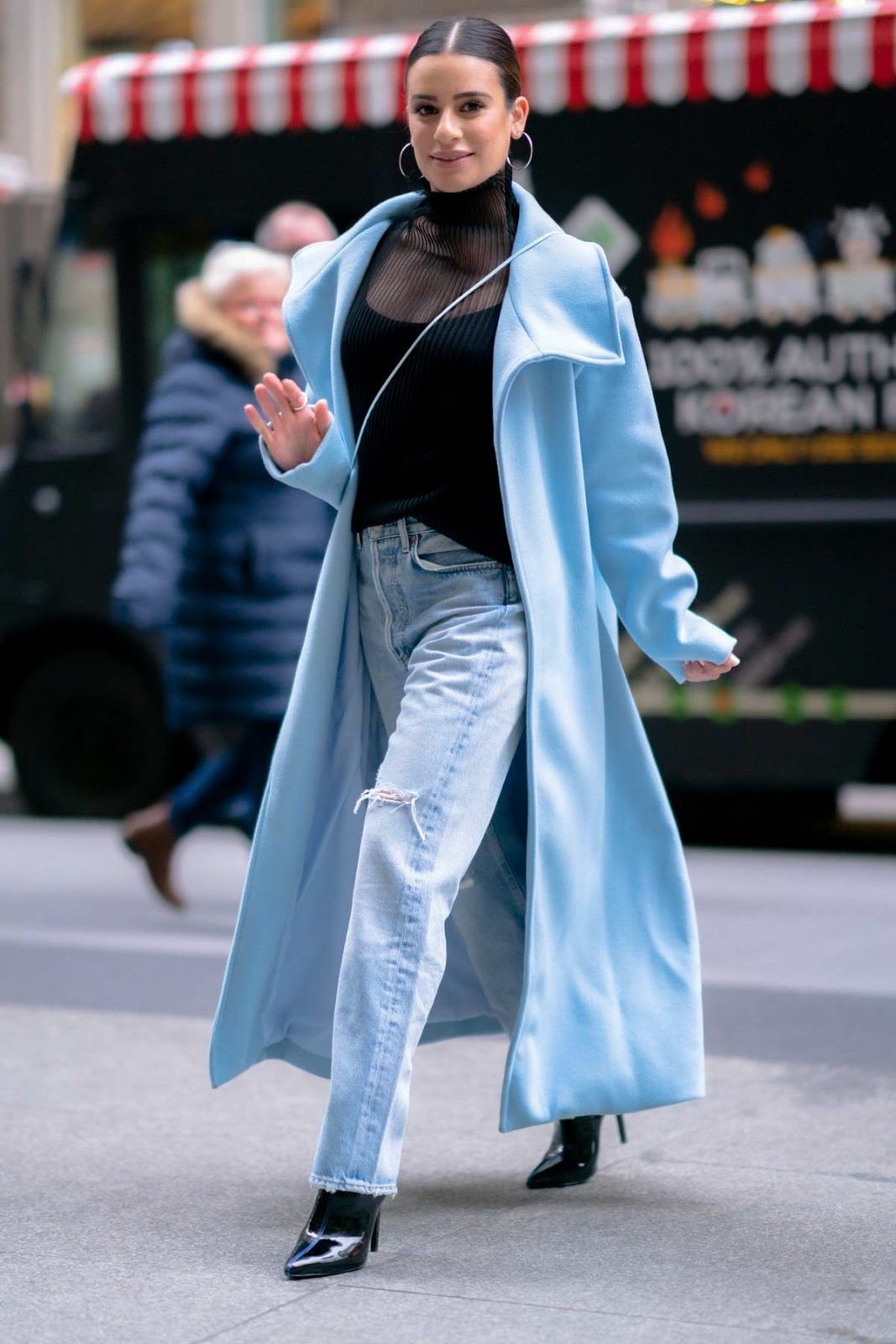 Lea Michele street style in a ice blue long coat in New York City