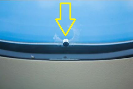 Small hole in flight window, small hole in aircraft window, Why is there a small hole in airplane windows? Small hole in airplane window, reasons behind