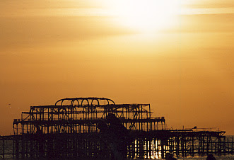 Image of sunset over wrecked second pier in Brighton and Hove, UK