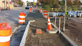 new sidewalks and curbing on West Central St
