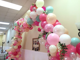  greenery balloon arch in rustic themed