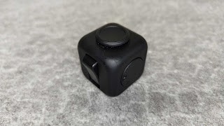Sides of the fidget cube with the tools
