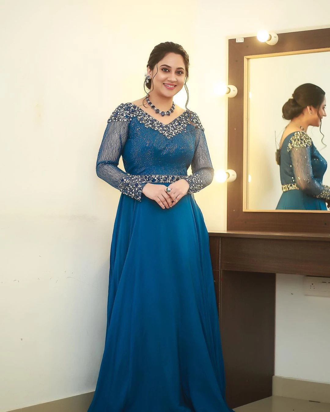 Malayalam Beauty Miya George in blue gown Photoshoot