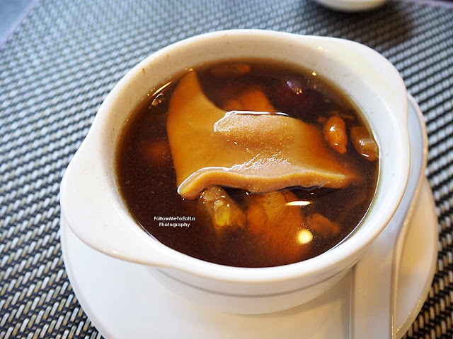 Double Boiled Chicken Soup with Black Garlic and Top Shell Meat