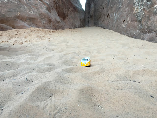 Yellow Van in sand on Landscape Arch trail