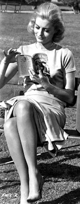 Constance Towers reads some pulp fiction in the sun.