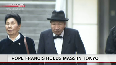 Iwao Hakamada, right, and his sister attend Pope Francis' mass