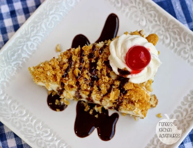 A slice of fried ice cream pie on a white plate overhead view ready to eat