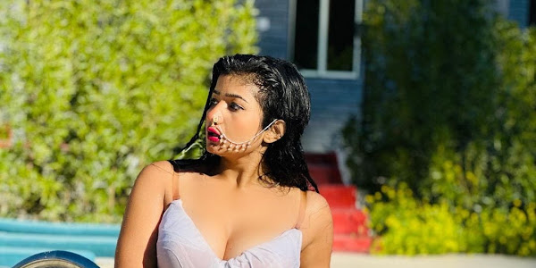 Neha Singh with White bikini dress in pool share in social media