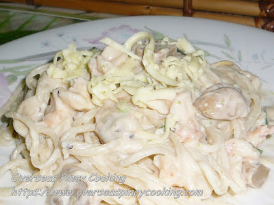 Spaghetti with Clam and Shrimp in White Sauce Dish