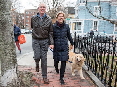 Elizabeth Warren walking holding hand with her husband Bruce