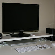 TV shelf with door stoppers for legs