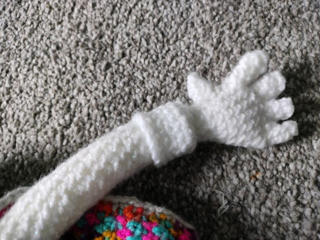Close up of the arm and glove
