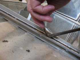 cleaning the screw channel on an aluminum trailer windows