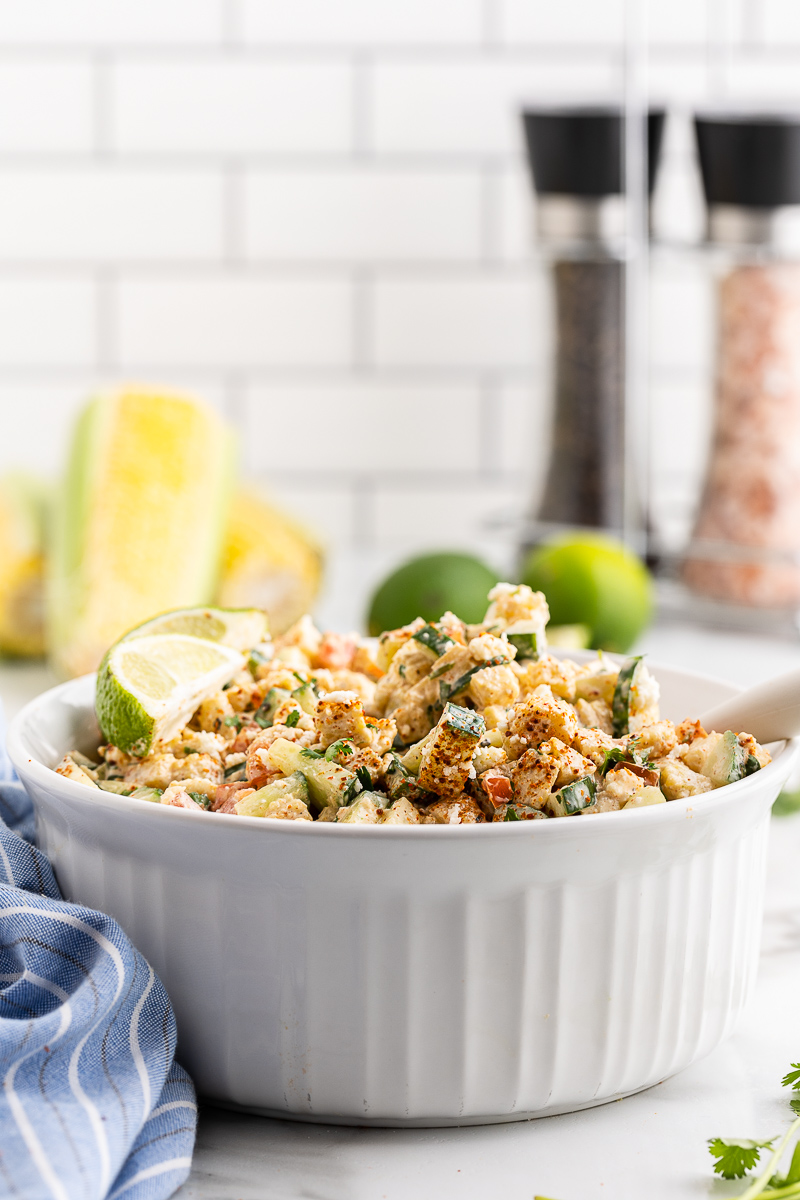 Low Carb Mexican Street Corn Salad in a white serving bowl.