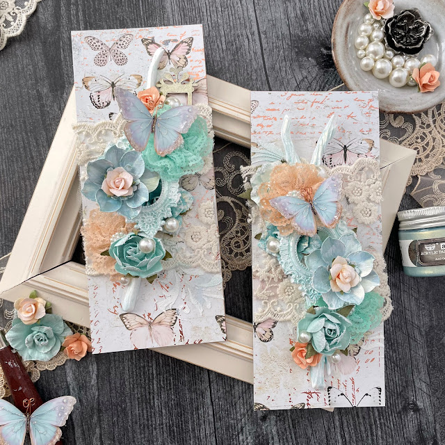 Mixed media panels created with: Prima Marketing apricot honey, peach tea, coffee break flowers, mechanicals grungy succulents, opal magic paint, moulds; Reneabouquets butterflies, glitter glass; Tim Holtz baubles