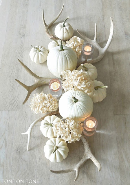 antlers centrepiece, white hydrangeas, white pumpkins, bleached wood