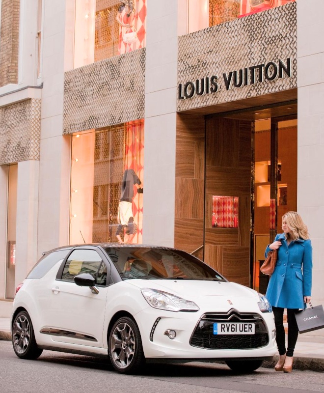 Citroen DS3 parked outside a Louis Vuitton shop