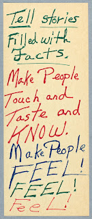 A color photograph of Octavia Butler's notes in green, red, and blue ink: "Tell stories filled with facts. Make people touch and taste and know. Make people Feel! Feel! Feel!"