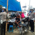 Sosialisasi New Normal, Kasat Lantas Polres Batu Bara Bagikan Seribu Masker