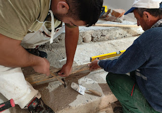 Fixing the battens into place with nails