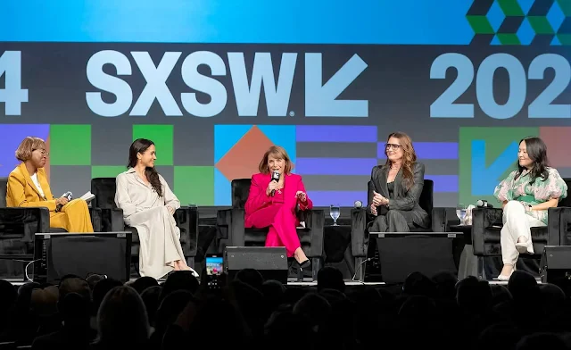 Meghan Markle wore a striped silk Husband shirt and a striped silk Lena skirt by Giuliva Heritage. Katie Couric and Brooke Shields