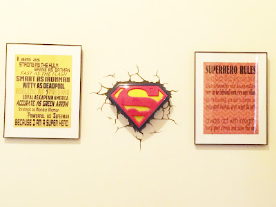 Easily decorate your superhero room with these Superhero printables and night light.  Night light is the 3D FX Superman light and is so easy to put it up, you'll feel like a villian who cheated when decorating your child's bedroom.