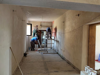 Working hard on the plastering