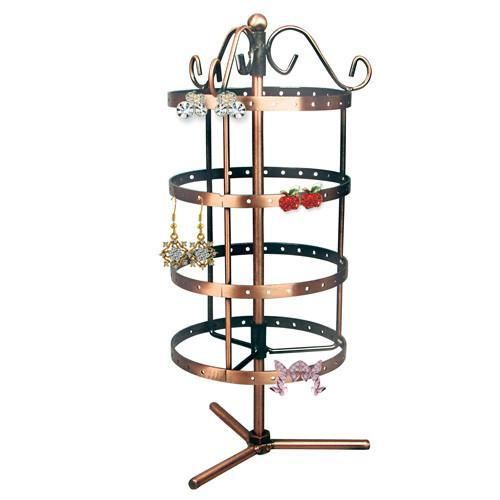 A rotating jewelry display stand in metal for dangling earrings.