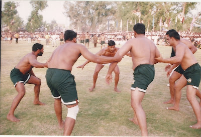 Ch. Muhammad Mansha (Left) in action