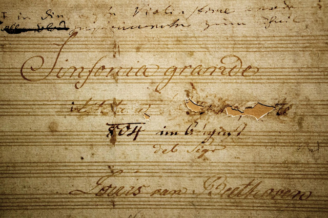 Titlepage of ms. of the Eroica Symphony, with Napoleon's name scored through by the composer