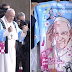 Pope Francis wears anime coat of his face during Japan trip