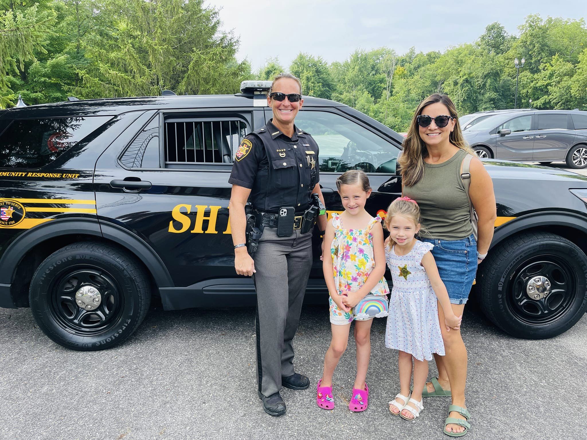 Deputy Hedrick with a family