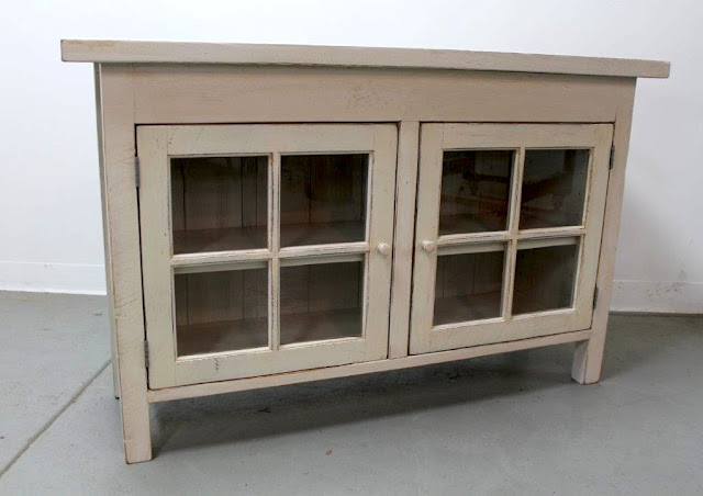 cream reclaimed wood cabinet with glass doors