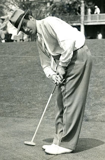 Golfer Harry Cooper stroking a putt in 1936