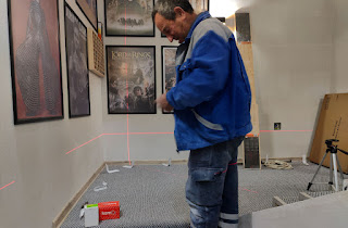 Using the laser to get a level for the shelf