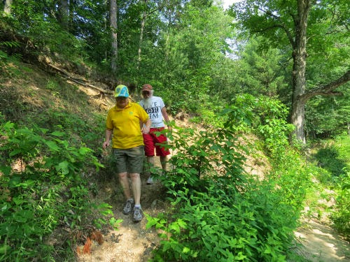 hikers by river