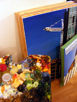 From Kate MacDonald's studio - a stack of paintings and a nasty, undisciplined palette. (Time to cut a new one, I guess.