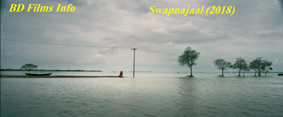 Swapnajaal (2018) is a Bangladeshi dramatic and romantic film, story and screenplay written and directed by Giasuddin Selim. The film is about the set of 1990s suburbs of Bangladesh and West Bengal against the background of communal riots. It is a love story between two young souls.The story of the film is very complex and dramatic. But truly it is a romantic tragic film. The two lovers have to move away but wish to reunite.    Plot Summary  Apu and Shuvra love each other very much. Apu is a son of a Muslim family.His father Rahaman Miah has a business of rice/paddy import export. Shuvra's father Hiran Shaha has an oil factory. Aynal Gazi is a local dominant person of the suburb Chandpur. He tactfully ousts Shuvra's family members after hiding Hiran Shaha. Shuvra's family is compelled to move to Kolkata. Shuvra's mother moves to Kolkata from Chandpur with her son Gopal and daughter Shuvra to her brother in law's house. Thereafter, Aynal Gazi kills Hiran Shaha with his activists and ousts Hiran Shaha's house and oil factory. Thandu, activist of Aynal Gazi marries Julekha and they start to live in Hiran's house. But Aynal Gazi keeps Hiran's oil factory to his right. Apu starts to go to Kolkata to see his lover Shuvra. But unfortunately, he goes to Agartala. He comes back home and can know that Aynal Gazi has killed Hiran Shaha from Julekha. Shuvra gets a job at the Minarva Theater by Biswambhar Babu. Biswambhar Babu is not all that a good person. So, Shuvra tries to avoid him. Aynal Gazi kills Thandu in suspicion that Thandu has killed Apu. But in the next time, he can know that Apu has come back from Agartala. Julekha moves to Faridpur. Apu goes to Kolkata informs Shuvra and her family members. Shuvra wants to come back to Chandpur with Apu for justice of the killer of her father. But her Uncle can know that Shuvra and Apu are so attractive to each others. So, he does not permit to to go with Apu. But Shuvra comes back Chandpur with Apu even leaving theater. They come to Julekha in Faridpur to take her witness for justice. The police catch Aynal Gazi. Shuvra's mother and brother come back to Chandpur. The two families do not accept the relationship of Apu and Shuvra. So, Apu's family compels him to go to Dhaka to take higher education.On the contrary, Shuvra's Family makes bound her to marry another person. She gets married. But Apu commits suicide jumping from the launch to the river. But Still now Shuvra wishes to reunite with Apu.   Casting  Yash Rohan as Apu  Pori Moni as Shuvra  Proson Azad as Hasi  Shahidul Islam Sachchu as Rahaman Miah  Farhana Mithu as Mrs. Rahaman  Misa Sawdagar as Hiran Shaha  Shilpi Sarkar Apu as Mrs. Shaha  ........ as Gopal  ......... as Aroti  Fazlur Rahman babu as Aynal Gazi  Sahana Sumi as Mrs. Gazi  Iresh Zaker as Thandu  Munia Islam as julekha  Shahed Ali as Anwar lawyer  Reshmi Sen as Maloti  Biplob Banarjee as Subal/Shuvra's Uncle  Bratya Basu as Haripado Barman  Irfan Selim Sujoy as.....  Sankar Chakraborty as Biswambar Babu  Sharmila Roy as......  Soma chakraborty  Ditypriya Roy  Haradhan  Tanish Chakraborty  Abhra  Robiul Hassan  Rajat Ganguly as Theater Owner.    Pre-Production, Production and Post Production Crews   Story, Screenplay and Direction: Giasuddin Selim Production Company: Bengal Creations and Bengal Sambhar  Assistant Screenplay writer: Robiul Alam Robi  Cinematography: Kamrul Hassan Khosru  Art Direction: Anowarul Haque and Samar Haldar  Executive Producer: Aung Rakhaine  Production Manager: Turan Munshi, Prashanta Das  Sound Recording: Azwad Ozzy, Babu Mitra  Assistant Directors: Syed Rasel,Nasiful Walid Amlan.  Head of Make Up Dept: Ahmed Bapi Malakar.  Costume Designer: Sharmin Akhter Mukta.  Props Master: Touhidul Islam Sentu.  Line Producer: Amil Islam, Manimala Pal.  Chief Assistant Director: Pinaki Majumdar  Editor: Eqbal Ahsanul Kabir.    Release Dates: 6th April, 2018 (Bangladesh), 27th April, 2018 (USA)    Filming Locations  The film is shot in Chandpur, Bangladesh and West Bengal, India.  A Short Review   Swapnajaal (2018) is a romantic tragic film in Bangladesh. The director Giasuddin selim has two best works such as the story of Adhiar (2003)  and Monpura (2008). Swapnajaal(2018) is also one of his best works. He starts shooting since 2016. The Film Swapnajaal (2018) is released on last April. Actually, he has written a strong story of the film so that the audiences are attractive to the film.    Direction  The film is started with a communal riot but ends with tragedy. But most of the times of the two's mid-time are used in romance. So it is a romantic film. But when the audiences feel tragedy sometimes, it turns into a tragic film. So, in a word, the film is romantic tragic film. Director Giasuddin Selim has tired his best in direction of all the sectors or departments such as screenplay, character selection, places selection according to the story, cinematography, sound and music, make up and costume, performance, art direction, props, color and lighting of the scenes according to the time and backdrop and editing. But there are some lacks in sound and music. I will describe about this, next.    Story and Screenplay  Director has made a strong screenplay from a creative story. Though it starts with a communal riot, but it has a strong love story. The river, beautiful nature, culture, religion are mixed with the love of the tow teenagers. It is a very simple love story. we can not find it in a such way in big city or town. The place is a suburb. It is like a village but there are some differences between them in factory, industries, business or structure. But the story is like a village love story and it is very simple. The story is very meaningful. So it will attract the viewers to watch it.    Character Selection and Performance  Character selection and direction or looking out in characters performance are very important achievement of the film. Director has selected some famous and skilled performers to characterize on the story. It is one of the best contribution of the film. Besides, the director has looked out in performances such as he has made the performances of Yash Rohan and Pori Moni something dramatic in some of the first scenes and it slowly turns into strong. So, the performances of them are different in different places and times. The director has looked out to its duration so that the audiences do not think it is slow motion film. So, he creates climaxes to make up the concern duration. He has tried some more fruitful scenes in a same time.    Places  Place is very important for showing the scenes according to the story. We can see generally four places in the film such as Chandpur, Agartala, Kolkata, Faridpur. So, in accordance with the story, the indefinite places will be shown in indefinite time. When the audiences will see the scenes, they extremely notice on the places and try to find out the name of the places. Because, for segmentation, place is very important. And the indefinite places have been shown in the indefinite scenes. So, the audiences will go with the story and they won't fell bore.    Art Direction, Props  Set design is very important in making creative film. We have seen some creative sets in the film that were not used in past such as Hiran's house. Keeping and selecting suitable props are also important work. The audiences will try to see the props in the next scenes also which they have seen in some former scenes. So, the director has to notice in this formula. The director has to keep and show the same props in the next scenes. We can see the same story in the film. We can see the same sets and props in next scenes also such as football, houses of Hiran Shaha etc.    Color and Lighting  We see the color of the film and it is like that the backdrop of the film is 1990s. Selection the color of the film is another important work. We also see the color of the dresses of Apu and Shuvra. In some scenes Apu has worn white color's shirt and Shuvra sometimes red, sometimes blue, sometimes white. Which color will match with the background scenes? This question is very important. And the director has to work following this rules. he has to adjust the color of the subject with the background scenes. We see a successful color matching in this film.          Make up and Costume  In film, make up and costume designing of the performers are very important work. This process is used to attract the audiences to the film mostly. So, These are necessary in films. We can see the correct matching of make up and costume of the performers such as on marriage day Shuvra's make up and dresses of the teenagers.    Cinematography  The cinematography of the film Swapnajaal (2018) is very fruitful. The cinematographer has taken the shots in a artistic way. The whole film has been made following some artistic ways. There are differences among the shots, frames and movement. The differences among the shots such as wide shots, long shots, mid shots, close shots and there are some extreme close shots to show the falling water from the eye.    Sound and Music  In the film Swapnajaal (2018) has some good contributions. But there is lack in songs and background music. Though it is a simple romantic film, there would be used some best songs. The songs will lose their appeal something I think. We see some scenes of the film without background music. In every moment we hear some sounds. It is natural. But if we can not hear background sound in all the scenes, it will lose its appeal something. It should not be kept the durations in blank.    Editing  Attachment and assembling of the scenes are looking good of the film. The process has made the film meaningful. Editing has made the story an audiovisual media. It has created an attractive work. But the editor should have been more concern at the time of assembling the shots and scenes with the sound. In some scenes, background sound should not have been blank.    In a word, Swapnajaal (2018) is a good film in Bangladesh for the year.  I hope that it it will be a successful film in Bangladesh in 2018. Though there are some lacks in some dept. but the whole dept. have tried their best to make it successful. 