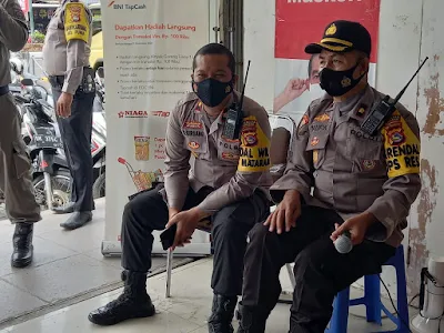 Foto Kompol Rafles P Girsang, S.I.K., bersama Kompol Taufik. S.IP