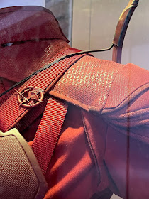 Katniss Everdeen red armor detail Hunger Games Mockingjay Part 2