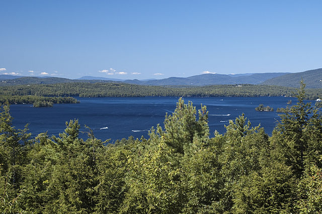 A lush New Hampshire lake and forest landscape