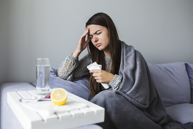 woman with flu medication