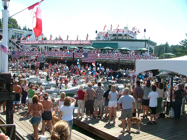 Roche Harbor crowds on the 4th of July, with childrens balloon games