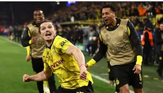 Borussia Dortmund reach Champions League semifinals with a helter-skelter 4-2 win over Atlético Madrid