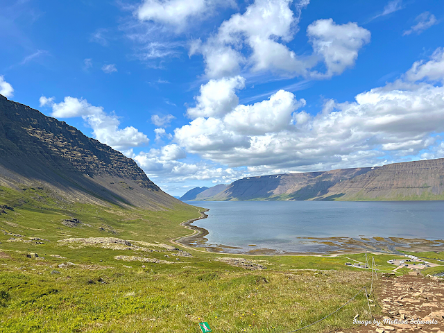 The calm waters of tunning Arnarfjörður take your breath away.