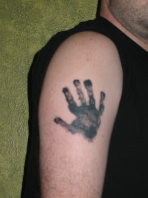 Handprint tattoo