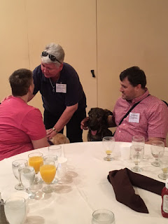 Audrey blessing Andrea and her guide at Top Dog