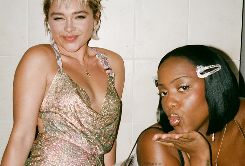 Florence Pugh and Rachel Chinouriri in a photo on the set of Rachel's music video for "Never Need Me".
